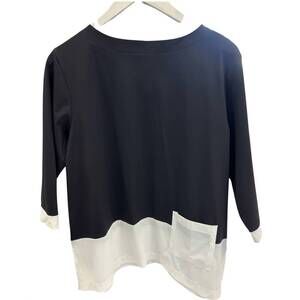 NEW TERRA women's modern contrast-hem pocket top in black/white